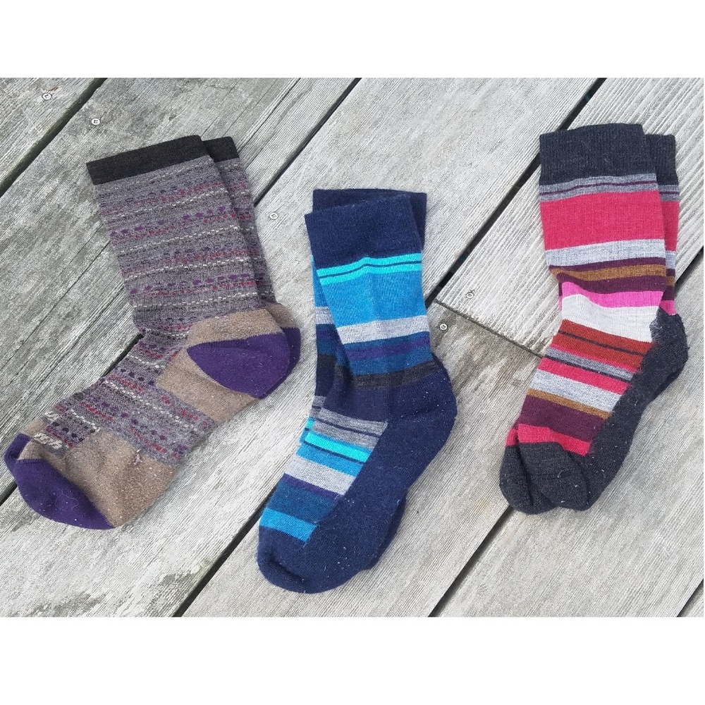 Two Smartwool, one Darn Tough women's socks